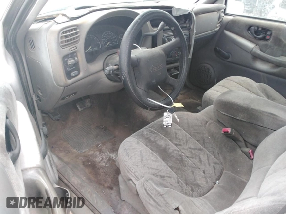 1999 GMC Sonoma with VIN 1GTCS1445X8532690, listed as a Copart auction lot 49197265 with Not Provided miles and Salvage Title. Bid and sale history available at DreamBid. Image 8.