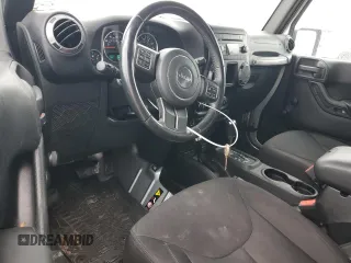 2015 Jeep Wrangler Sport with VIN 1C4AJWAG3FL560599, listed as a Copart auction lot 51850005 with 52,691 mi miles and Clean Title. Bid and sale history available at carsss.com. Image 8.