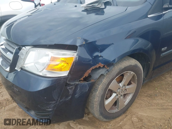 2009 Dodge Grand Caravan SXT z VIN 2D8HN54X89R645251, wystawiony jako IAAI lot #41916035 z przebiegiem 183 678 mil mil oraz . Historia ofert i sprzedaży dostępna na DreamBid. Obrazek 6.