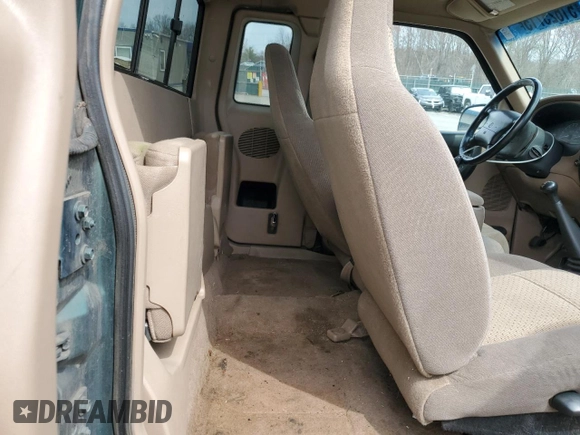 1999 Mazda B-Series Truck SE with VIN 4F4ZR17X2XTM25631, listed as a Copart auction lot 51625715 with 204,134 mi miles and Salvage Title. Bid and sale history available at DreamBid. Image 10.