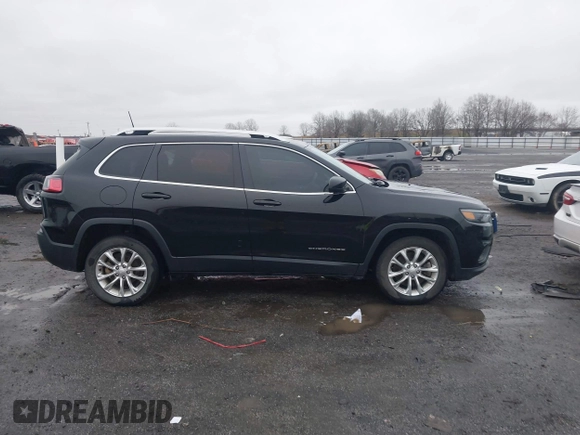 2019 Jeep Cherokee Latitude with VIN 1C4PJLCB1KD339906, listed as a IAAI auction lot 41539248 with 123,243 mi miles and . Bid and sale history available at carsss.com. Image 14.