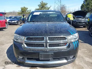 2013 Dodge Durango Crew z VIN 1C4RDJDG9DC677142, wystawiony jako IAAI lot #41834251 z przebiegiem 138 307 mil mil oraz . Historia ofert i sprzedaży dostępna na DreamBid. Obrazek 12.