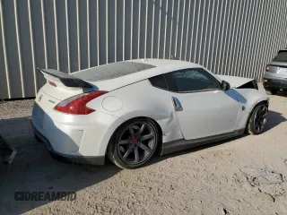 2014 Nissan 370Z Touring with VIN JN1AZ4EH5EM630793, listed as a Copart auction lot 77950484 with 110,229 mi miles and Salvage Title. Bid and sale history available at carsss.com. Image 3.