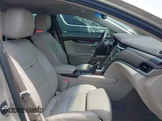 2014 Cadillac XTS Luxury z VIN 2G61M5S38E9291182, wystawiony jako IAAI lot #42495838 z przebiegiem 104 941 mil mil oraz . Historia ofert i sprzedaży dostępna na DreamBid. Obrazek 5.