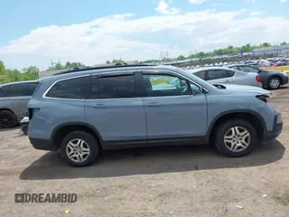 2022 Honda Pilot Special Edition with VIN 5FNYF6H27NB104990, listed as a IAAI auction lot 42219770 with 23,200 mi miles and . Bid and sale history available at DreamBid. Image 13.