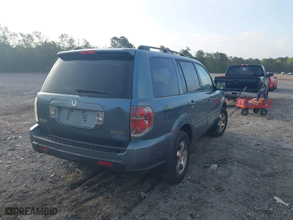 2006 Honda Pilot EX-L with VIN 5FNYF18516B002860, listed as a IAAI auction lot 41963343 with 202,799 mi miles. Bid and sale history available at carsss.com. Image 4.
