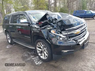 2015 Chevrolet Suburban LTZ with VIN 1GNSKKKC5FR255373, listed as a IAAI auction lot 42012528 with 219,030 mi miles and . Bid and sale history available at DreamBid. Image 1.