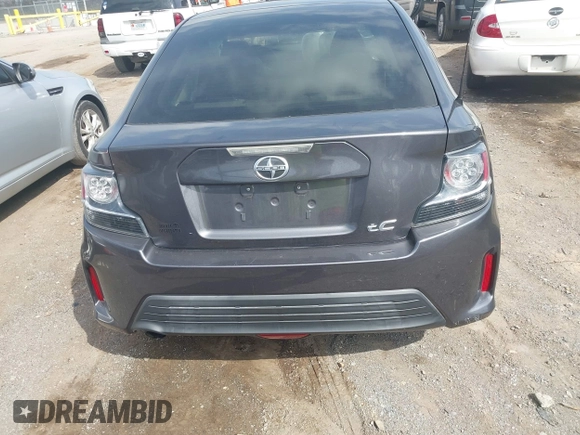 2015 Scion tC z VIN JTKJF5C70FJ013710, wystawiony jako IAAI lot #41770647 z przebiegiem Nie podano mil oraz . Historia ofert i sprzedaży dostępna na DreamBid. Obrazek 16.