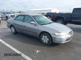 2000 Honda Accord LX z VIN 1HGCG1644YA003371, wystawiony jako IAAI lot #41493189 z przebiegiem 193 845 mil mil oraz . Historia ofert i sprzedaży dostępna na DreamBid. Obrazek 1.