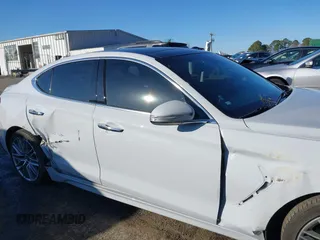 2021 Genesis G70 2.0T with VIN KMTG34LA6MU075190, listed as a IAAI auction lot 41474675 with 72,743 mi miles and . Bid and sale history available at DreamBid. Image 13.