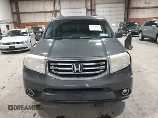 2012 Honda Pilot Touring with VIN 5FNYF4H99CB052034, listed as a IAAI auction lot 42023430 with 137,428 mi miles. Bid and sale history available at carsss.com. Image 12.