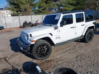 2023 Jeep Wrangler 4xe Sahara with VIN 1C4JJXP61PW684682, listed as a IAAI auction lot 40998281 with 41,138 mi miles. Bid and sale history available at carsss.com. Image 17.