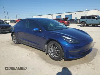 2022 Tesla Model 3 with VIN 5YJ3E1EA8NF322335, listed as a Copart auction lot 48187265 with 22,265 mi miles and Clean Title. Bid and sale history available at DreamBid. Image 4.