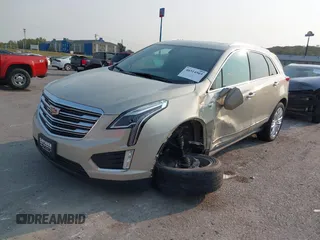 2017 Cadillac XT5 Premium Luxury FWD z VIN 1GYKNCRSXHZ164468, wystawiony jako IAAI lot #40314503 z przebiegiem 94 008 mil mil oraz . Historia ofert i sprzedaży dostępna na DreamBid. Obrazek 2.