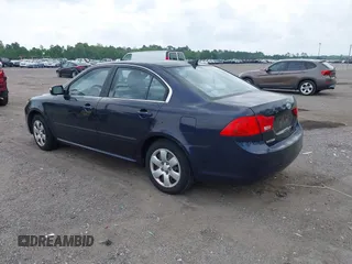 2010 Kia Optima LX z VIN KNAGG4A89A5400338, wystawiony jako IAAI lot #42410076 z przebiegiem 253 870 mil mil oraz . Historia ofert i sprzedaży dostępna na DreamBid. Obrazek 3.