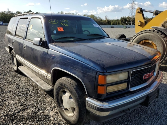 1998 GMC Yukon with VIN 1GKEK13R6WJ706204, listed as a Copart auction lot 77577074 with 186,023 mi miles and Salvage Title. Bid and sale history available at carsss.com. Image 4.