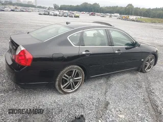 2006 Infiniti M45 with VIN JNKBY01EX6M205854, listed as a Copart auction lot 70985734 with 154,631 mi miles and Salvage Title. Bid and sale history available at carsss.com. Image 3.
