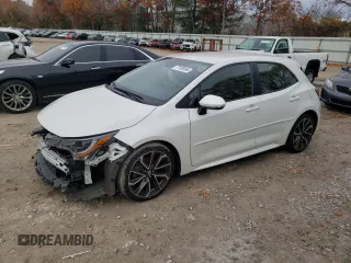2019 Toyota Corolla Hatchback SE with VIN JTNK4RBEXK3051691, listed as a Copart auction lot 77159164 with 21,051 mi miles and Salvage Title. Bid and sale history available at carsss.com. Image 1.