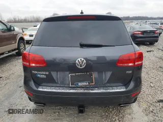 2012 Volkswagen Touareg Sport z VIN WVGFK9BP6CD005005, wystawiony jako Copart lot #46802355 z przebiegiem 141 430 mil mil oraz Czysty tytuł • Clean title. Historia ofert i sprzedaży dostępna na DreamBid. Obrazek 6.
