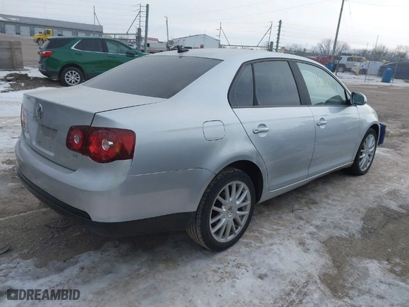 2008 Volkswagen Jetta Sedan Wolfsburg with VIN 3VWRJ71K18M185744, listed as a IAAI auction lot 41389714 with 107,446 mi miles. Bid and sale history available at carsss.com. Image 4.