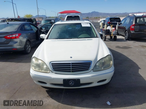 2002 Mercedes-Benz S 5.0L with VIN WDBNG75J92A261294, listed as a IAAI auction lot 42141509 with 116,532 mi miles. Bid and sale history available at carsss.com. Image 6.