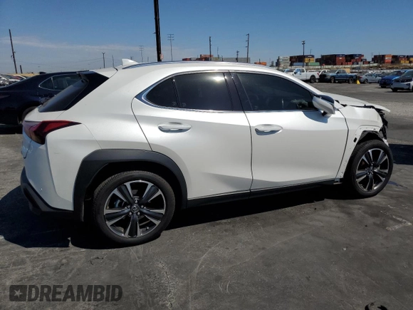 2024 Lexus UX with VIN JTHX6JBH7R2189588, listed as a Copart auction lot 70237664 with 9,963 mi miles and Salvage Title. Bid and sale history available at carsss.com. Image 3.