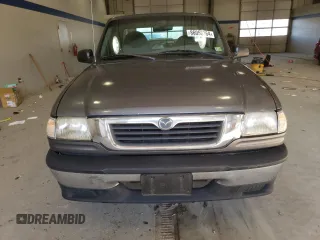 2000 Mazda B-Series 2WD Truck SX with VIN 4F4YR12V7YTM24901, listed as a Copart auction lot 86050364 with 230,776 mi miles and Clean Title. Bid and sale history available at carsss.com. Image 5.