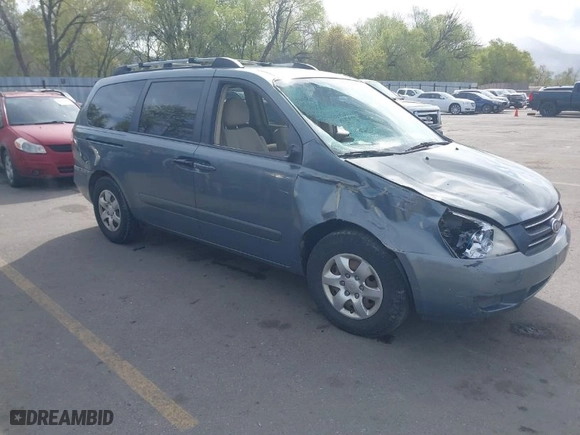 2006 Kia Sedona LX with VIN KNDMB233966090557, listed as a IAAI auction lot 42079046 with 198,851 mi miles. Bid and sale history available at carsss.com. Image 1.