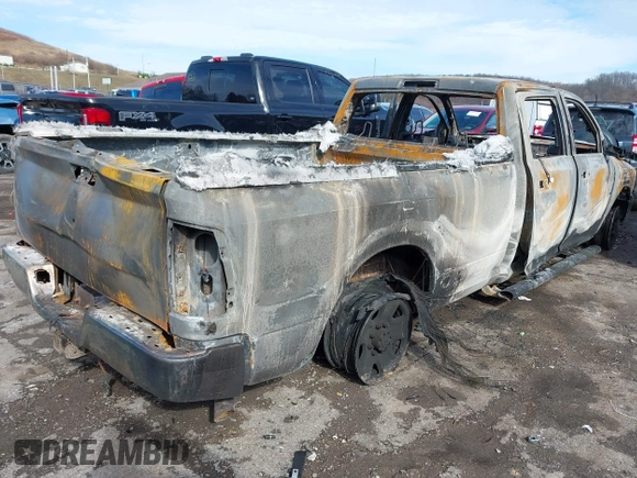 2017 Ram 2500 Tradesman with VIN 3C6UR5HJ8HG538817, listed as a IAAI auction lot 41492975 with 128,000 mi miles and . Bid and sale history available at DreamBid. Image 4.