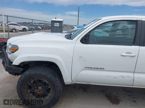2017 Toyota Tacoma SR5 z VIN 5TFCZ5ANXHX065886, wystawiony jako IAAI lot #42308228 z przebiegiem 294 931 mil mil oraz . Historia ofert i sprzedaży dostępna na DreamBid. Obrazek 6.