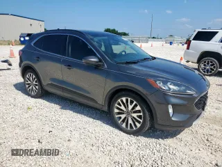 2020 Ford Escape Titanium Hybrid z VIN 1FMCU0DZ1LUC38345, wystawiony jako Copart lot #59628985 z przebiegiem 86 917 mil mil oraz Szkoda całkowita • Salvage title. Historia ofert i sprzedaży dostępna na DreamBid. Obrazek 4.