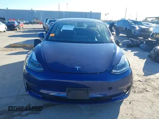 2023 Tesla Model 3 with VIN 5YJ3E1EA6PF505252, listed as a IAAI auction lot 41380172 with 31,141 mi miles and . Bid and sale history available at DreamBid. Image 11.