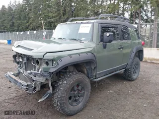 2011 Toyota FJ Cruiser with VIN JTEBU4BF5BK108168, listed as a IAAI auction lot 41829688 with 163,354 mi miles. Bid and sale history available at carsss.com. Image 18.