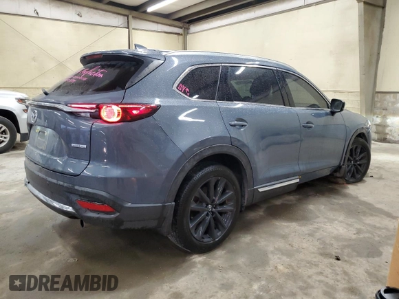 2021 Mazda CX-9 Carbon Edition with VIN JM3TCADY2M0527657, listed as a Copart auction lot 46650145 with 69,439 mi miles and Salvage title. Bid and sale history available at DreamBid. Image 3.