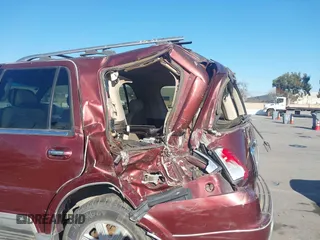 2003 Lincoln Navigator Ultimate with VIN 5LMFU27R73LJ07007, listed as a IAAI auction lot 41403659 with 1 mi miles. Bid and sale history available at carsss.com. Image 6.