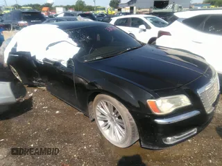 2013 Chrysler 300 C z VIN 2C3CCAET4DH641137, wystawiony jako IAAI lot #36767469 z przebiegiem Nie podano mil oraz . Historia ofert i sprzedaży dostępna na DreamBid. Obrazek 1.