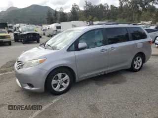 2015 Toyota Sienna LE AAS with VIN 5TDKK3DC5FS584877, listed as a Copart auction lot 50744255 with 164,556 mi miles and Salvage Title. Bid and sale history available at carsss.com. Image 1.