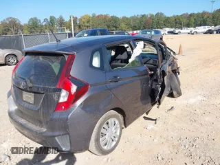2017 Honda Fit LX with VIN JHMGK5H58HS022560, listed as a IAAI auction lot 40710663 with 86,228 mi miles and . Bid and sale history available at DreamBid. Image 4.