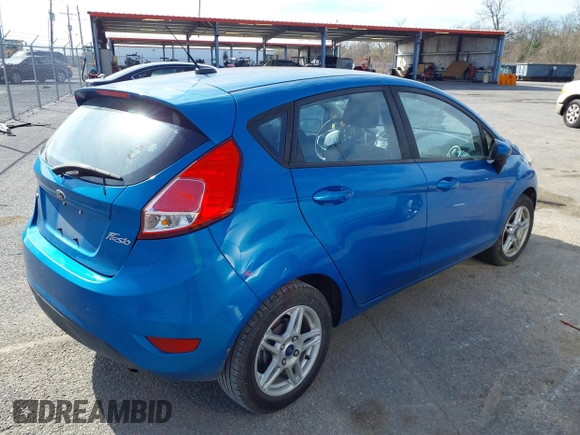 2017 Ford Fiesta SE with VIN 3FADP4EJ2HM158151, listed as a IAAI auction lot 41624161 with 61,284 mi miles. Bid and sale history available at carsss.com. Image 4.