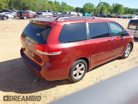 2011 Toyota Sienna LE AAS with VIN 5TDKK3DC5BS002349, listed as a IAAI auction lot 42058258 with 284,140 mi miles. Bid and sale history available at carsss.com. Image 4.