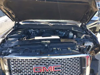 2016 GMC Yukon XL Denali with VIN 1GKS1HKJ5GR435925, listed as a IAAI auction lot 41727259 with 137,098 mi miles. Bid and sale history available at carsss.com. Image 10.