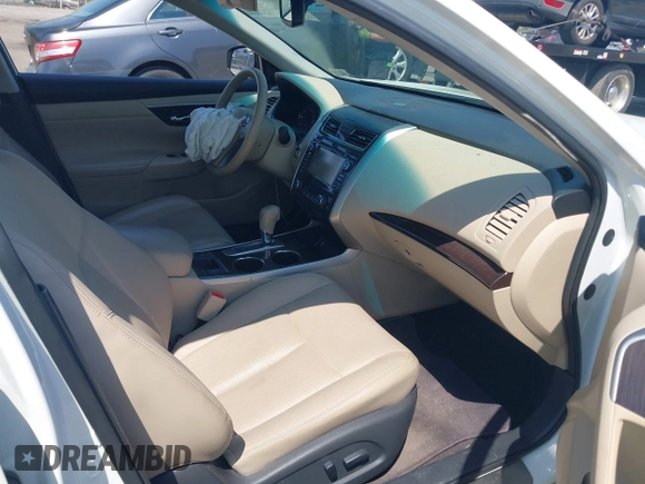 2015 Nissan Altima S with VIN 1N4AL3AP2FN399469, listed as a IAAI auction lot 42021456 with 33,885 mi miles and . Bid and sale history available at DreamBid. Image 5.