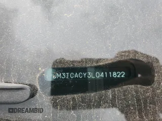 2020 Mazda CX-9 Touring z VIN JM3TCACY3L0411822, wystawiony jako Copart lot #60323295 z przebiegiem 61 348 mil mil oraz Szkoda całkowita • Salvage title. Historia ofert i sprzedaży dostępna na DreamBid. Obrazek 14.