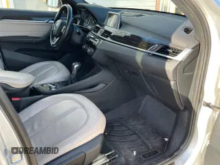 2017 BMW X1 sDrive28i with VIN WBXHU7C39H5H34971, listed as a Copart auction lot 51869265 with 108,051 mi miles and Clean Title. Bid and sale history available at carsss.com. Image 5.