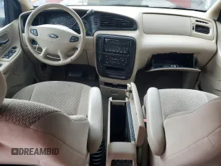 2003 Ford Windstar SE z VIN 2FMZA52443BA89393, wystawiony jako Copart lot #56144805 z przebiegiem 71 587 mil mil oraz Tytuł czysty. Historia ofert i sprzedaży dostępna na DreamBid. Obrazek 8.