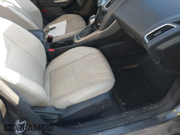 2015 Ford Focus Titanium with VIN 1FADP3J28FL348625, listed as a IAAI auction lot 41674741 with 223,585 mi miles and . Bid and sale history available at carsss.com. Image 5.