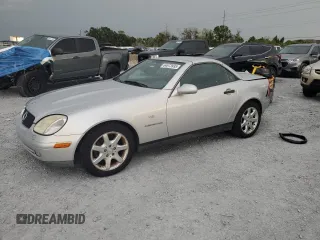 1998 Mercedes-Benz SLK 230/320 with VIN WDBKK47F6WF023761, listed as a Copart auction lot 64673935 with 106,608 mi miles and Salvage title. Bid and sale history available at DreamBid. Image 1.