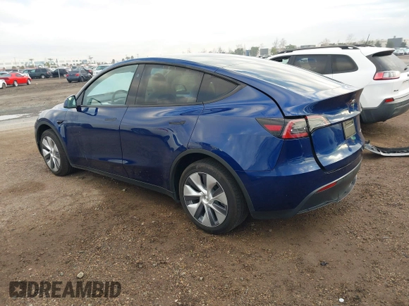 2023 Tesla Model Y Long Range with VIN 7SAYGDEE6PF947827, listed as a IAAI auction lot 41443524 with 12,381 mi miles and . Bid and sale history available at DreamBid. Image 3.