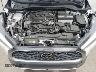 2023 Toyota Corolla Cross XLE z VIN 7MUDAAAG7PV051492, wystawiony jako Copart lot #61185635 z przebiegiem 79 364 mil mil oraz Nie do naprawy • Non repairable. Historia ofert i sprzedaży dostępna na DreamBid. Obrazek 12.