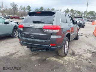 2014 Jeep Grand Cherokee Laredo with VIN 1C4RJEAG1EC573704, listed as a IAAI auction lot 41864355 with 141,970 mi miles. Bid and sale history available at carsss.com. Image 4.